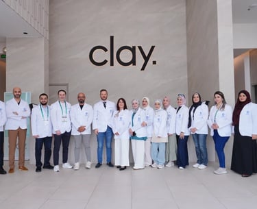 A group of Vitatech professionals posing together at Clay Clinic.