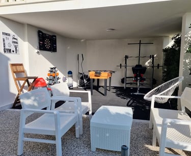 The photo shows an outdoor Fun and Fitness area with home equipment.