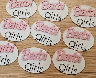a number of baby shower signs on a table