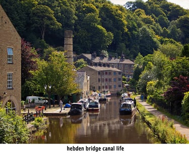 barges and people at hebden bridge on the rochdale canal
