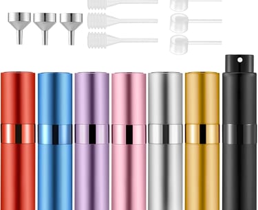 a variety of different colored bottles of different colors