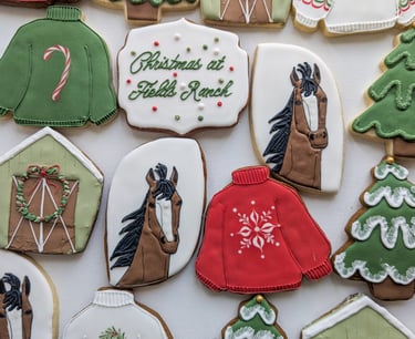Cookies for a film crew of horses, trees, Christmas sweaters, and barns