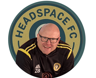 Smiling man in sports apparel with glasses in front of the Headspace FC logo.