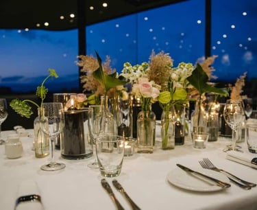 beautiful table set up for dinner with beautiful flowers