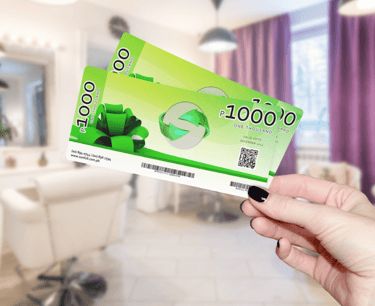 a person holding a green card with a green card