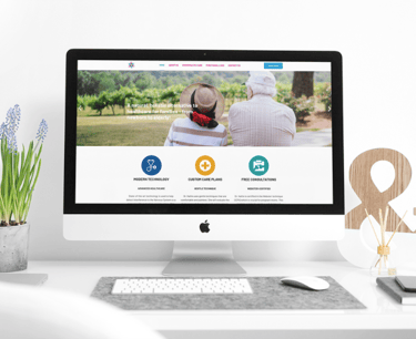 a computer monitor screen displaying a website page on a desktop computer