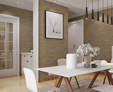 Modern dining room with brown textured wallpaper, white table, and black pendant lights.