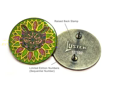 Enamel pins showing back stamp and sequential numbering