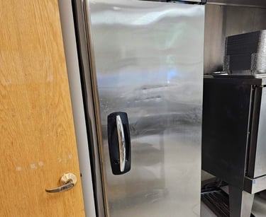 appliance repair technician is fixing commercial Ice Maker Hoshizaki in Charlotte