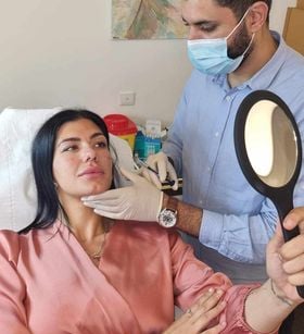 a woman in a mask mask and a man in a mask