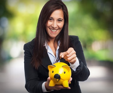 a woman in a business suit holding a piggy piggygy piggy pig