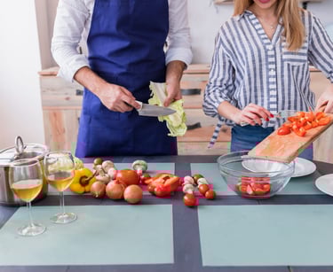 a sugar baby and sugar mommy are preparing to cook together