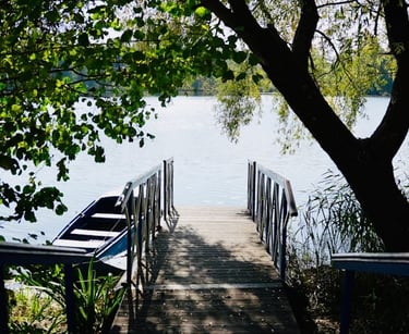 a boat dock with a boat on the water