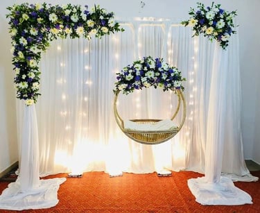 a hanging chair with flowers in a room