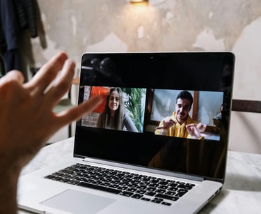 Man and Woman in Video Conference photo by CottonBros Studio