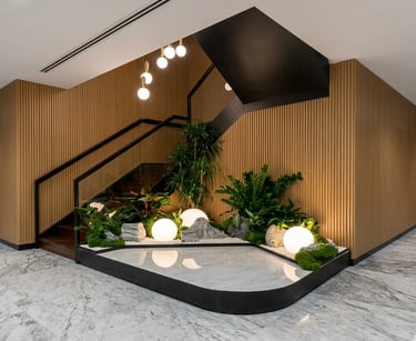 Indoor Zen garden design at The Gardens South Tower KL with glowing orb lighting.