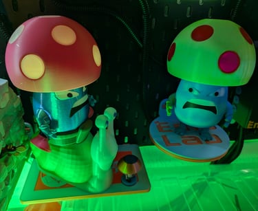 Development prototype Shroomen USB LED lights including a snail rider..