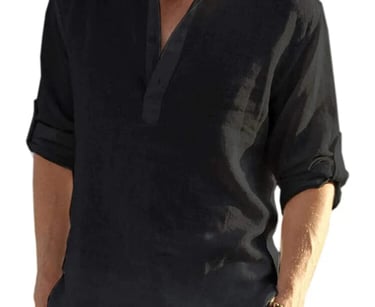 a man in a black henley shirt and white pants