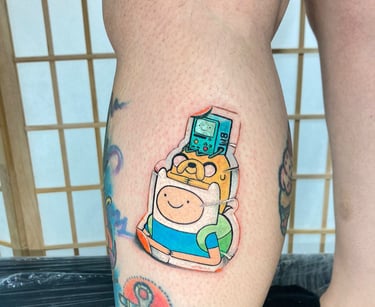 Sticker Tattoo style in the leg. custom piece by Katarsis Tattoo Perú