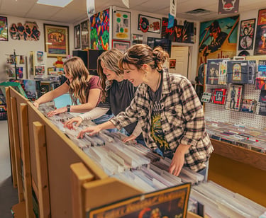 Senior pictures in a record store by Lancaster PA senior picture photographer. Senior Rep Team
