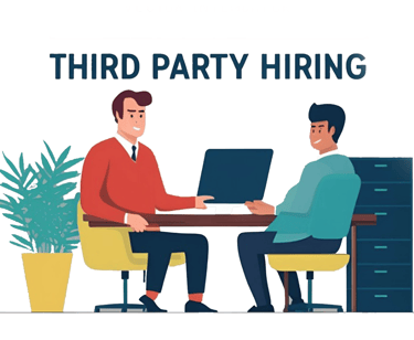 a man and woman sitting at a table with a laptop