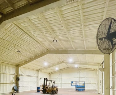 spray foam insulation inside of a barn in lakewood, colorado