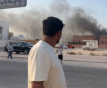 a man standing on a street corner with a sign that says,'stop and