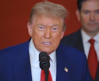 a man in a suit and tie with a microphone