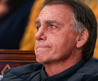 a man in a black jacket and a woman in a black shirt