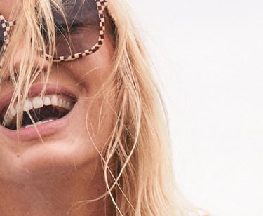 Woman laughing with unique designer frames