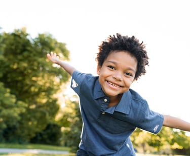 child playing airplane