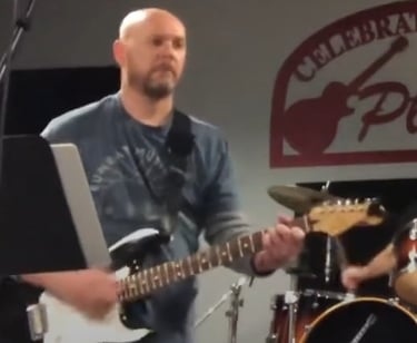 William Finn from Finn's Echo performing in front of live audience