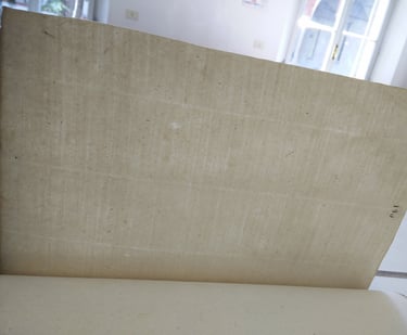 Markings from the wire sieve mould on a paper record from 14th century Parma.