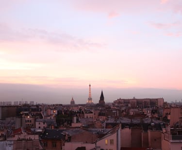 Soft pastel colors of the Parisian skyline.