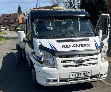 alt="Recovery truck loading non-runner car in Evesham"