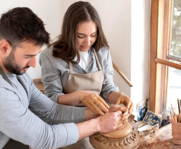 a sugar mommy and sugar baby are making pottery pottery pots