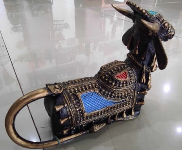  "Sitting brass designer bull figurine with vibrant red and blue detailing – ethnic brass art-for export markets"