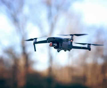 dji mavic 3 drone in mid air taking photographs