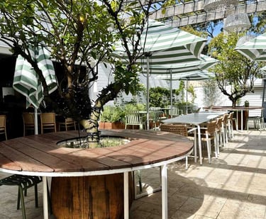 a table with a wooden table and chairs