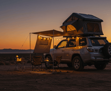 Car rooftop tent at a campsite with camping chairs