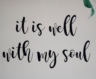 a wall with a quote about 'it is well with my soul'