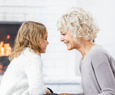 Grandmother and child are spending time together after holistic support for cancer side effects