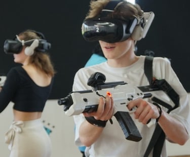 a man and woman in vr headsets with vr goggles