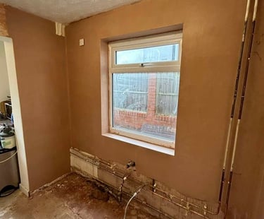 Smooth plaster applied to a newly constructed wall.