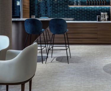 a modern looking bar with a bar stool and a bar stool