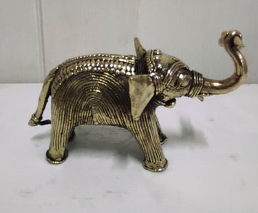"Handcrafted brass baby elephant featuring detailed tribal patterns-Globally demanded"