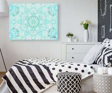 Digital image featuring a kaleidoscope design on a canvas prints handing on a bedroom wall.