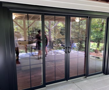Energy-efficient sliding patio door installation and replacement project by Uprise Renovation