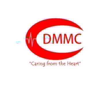 DMMC medical logo with a red crescent, heart rate monitor line, and the slogan Caring from the Heart.