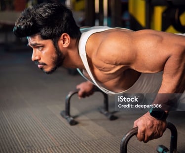 a man doing push ups with handles